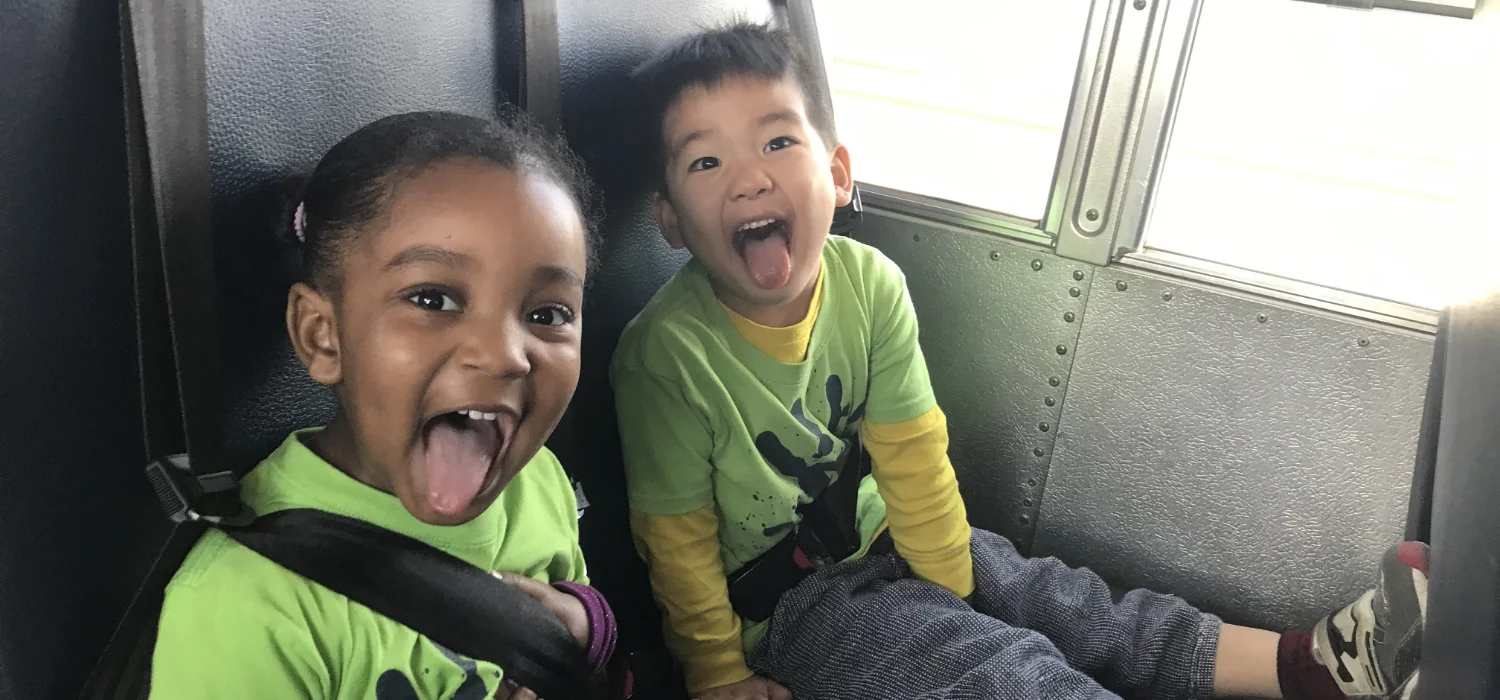 two students on a bus