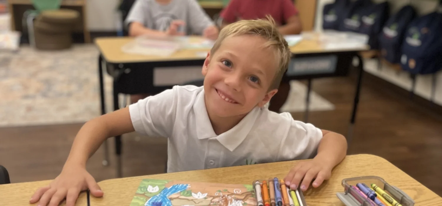 student at school desk